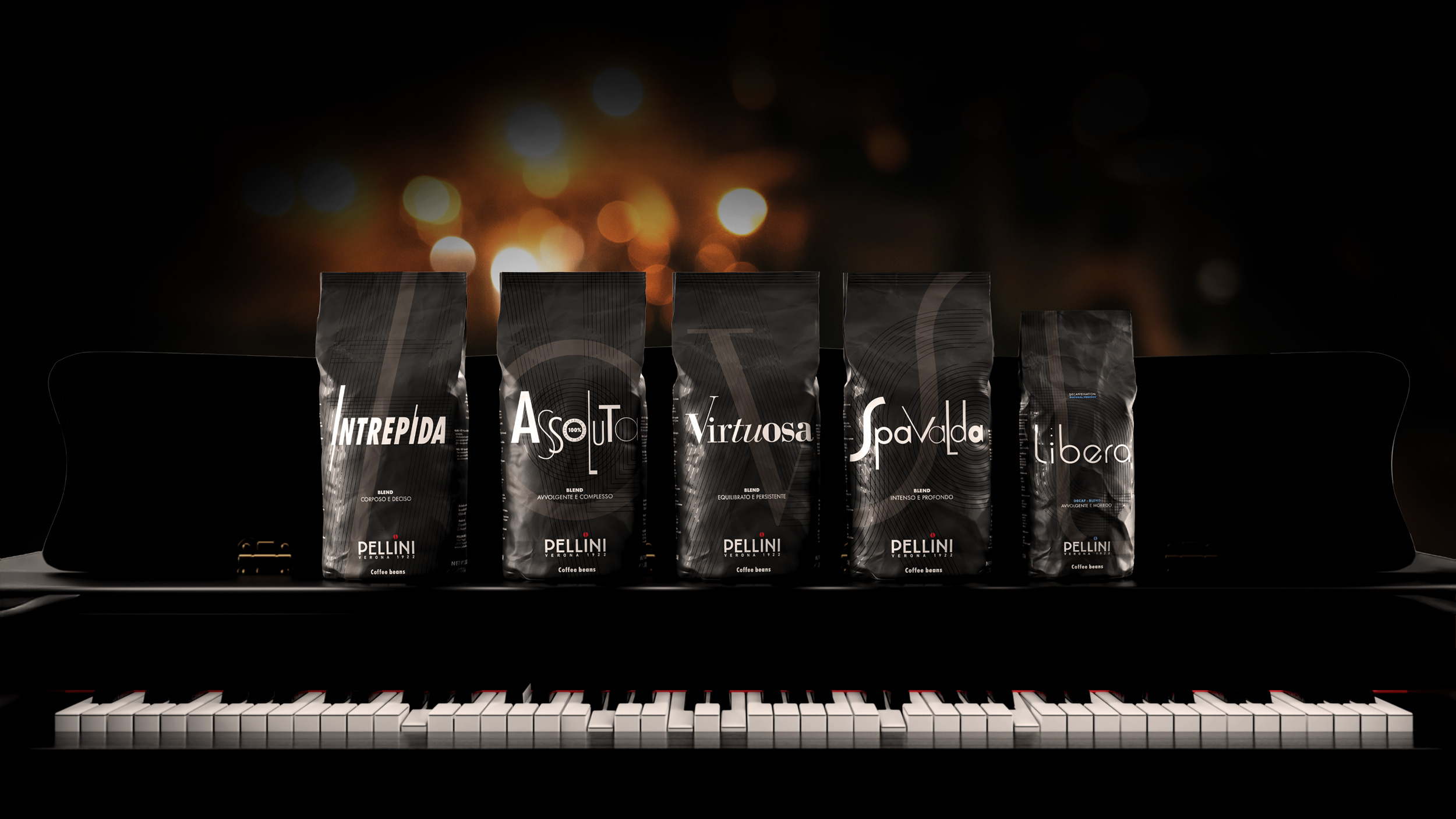 Miscele professional Gamma completa delle cinque referenze Pellini professional in grani disposte su un pianoforte