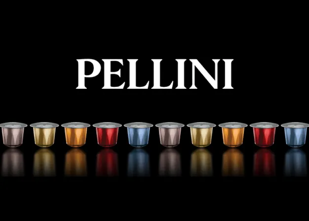 Capsule Pellini di vari colori disposte in linea